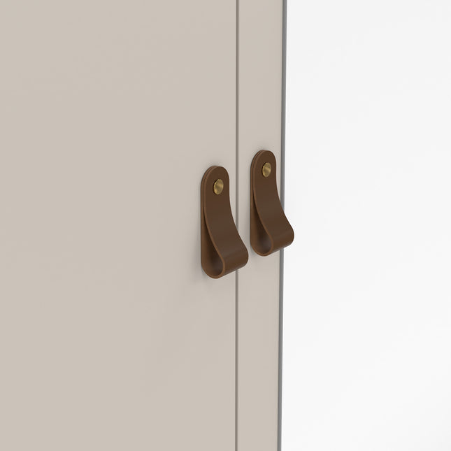 Two cabinet doors with curved brown handles and brass accents, set against a light-coloured background
