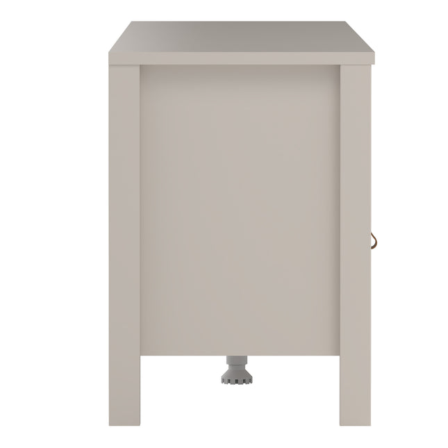 Side view of a light grey cabinet with a flat top, featuring a single door and a small handle