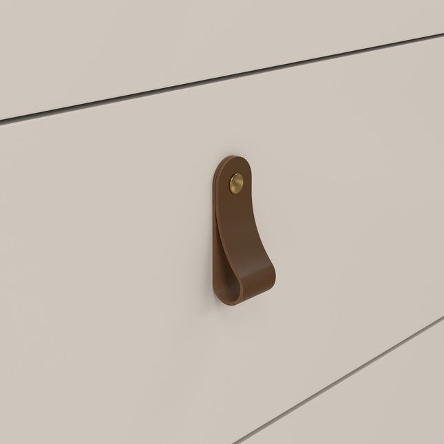 Brown leather handle with a brass stud on a smooth, light-coloured drawer front