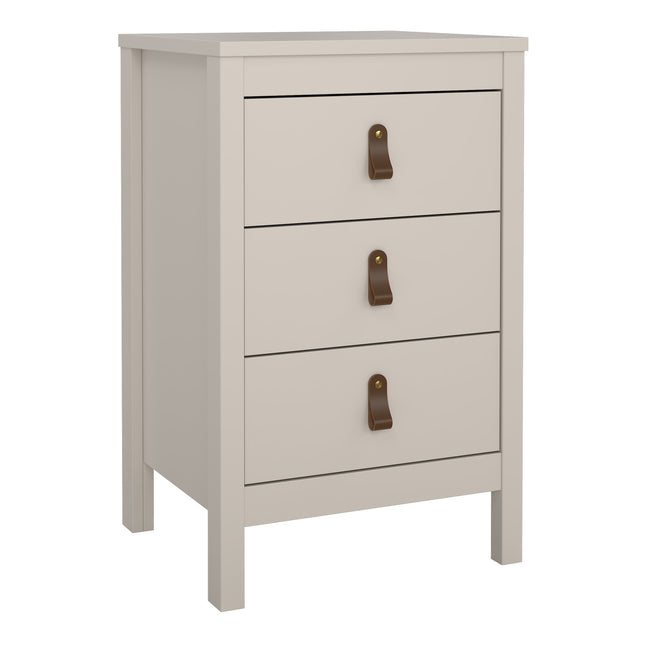Three-drawer bedside table in soft beige with leather pull handles and a smooth top surface