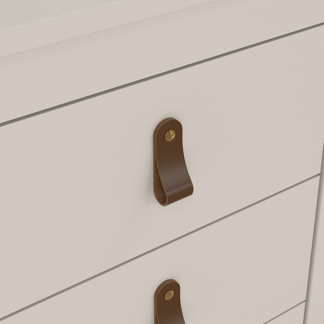 Three-drawer bedside table in light wood with brown leather handles and brass accents