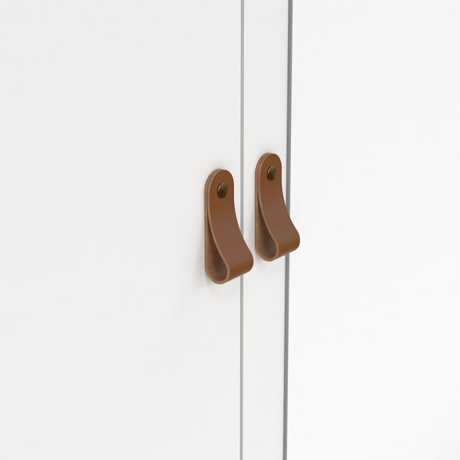 Two brown leather handles on a white cabinet door, featuring a smooth finish and minimalist design