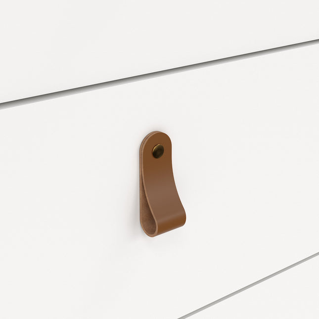 Brown leather handle on a white drawer front, featuring a smooth finish and a rounded design