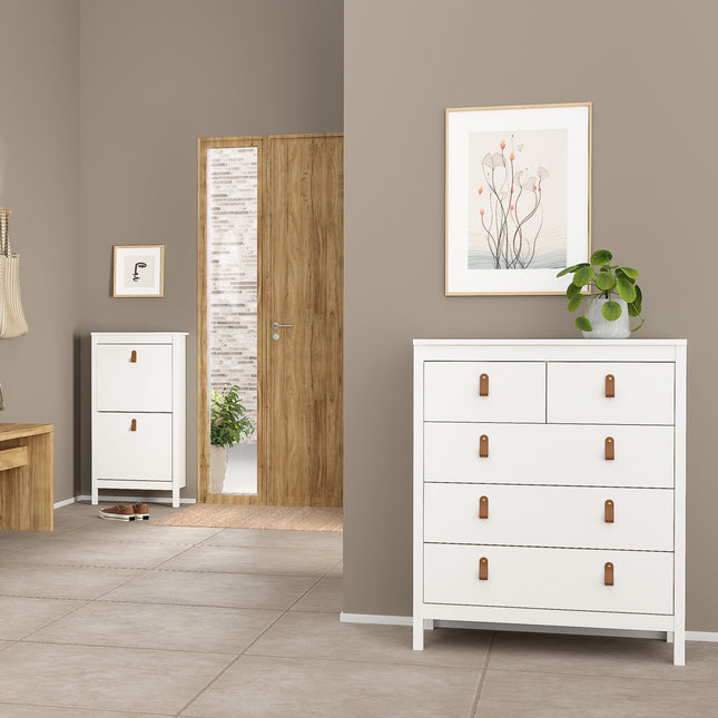 Chest of drawers with three large and two smaller drawers, finished in white with brown leather handles