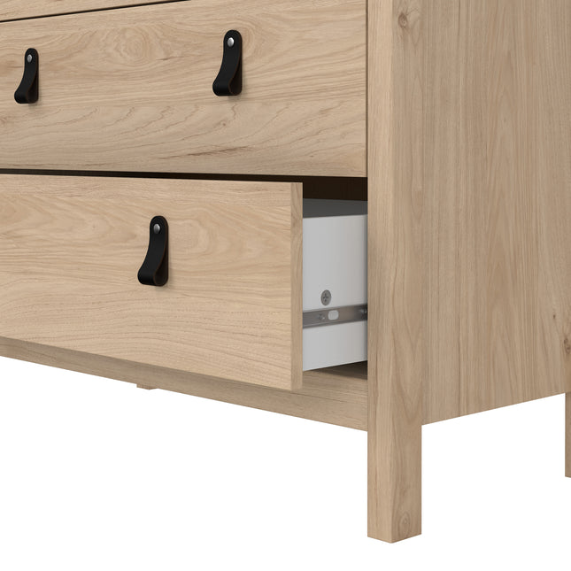 Chest of drawers with three large and two smaller drawers, made of light wood with black metal handles