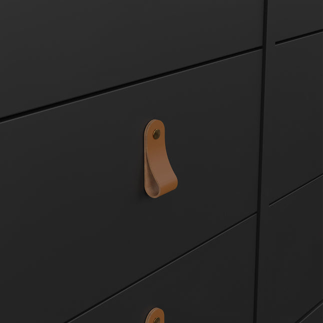 Close-up of a black drawer front featuring a tan leather handle with a brass stud