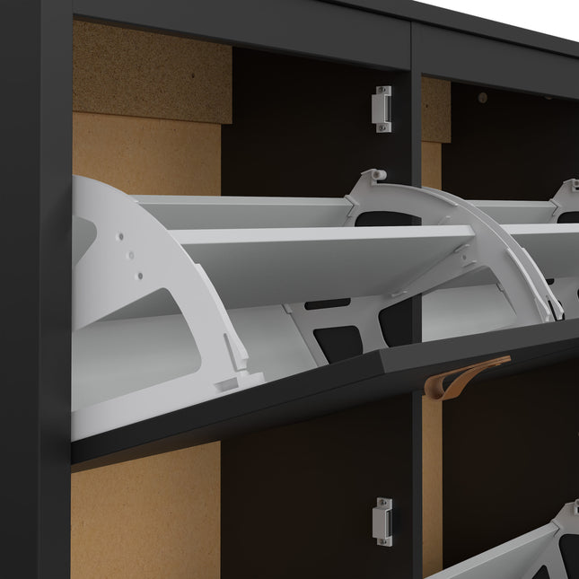 Cabinet with four compartments featuring white shelves and brown leather handles, set against a dark frame