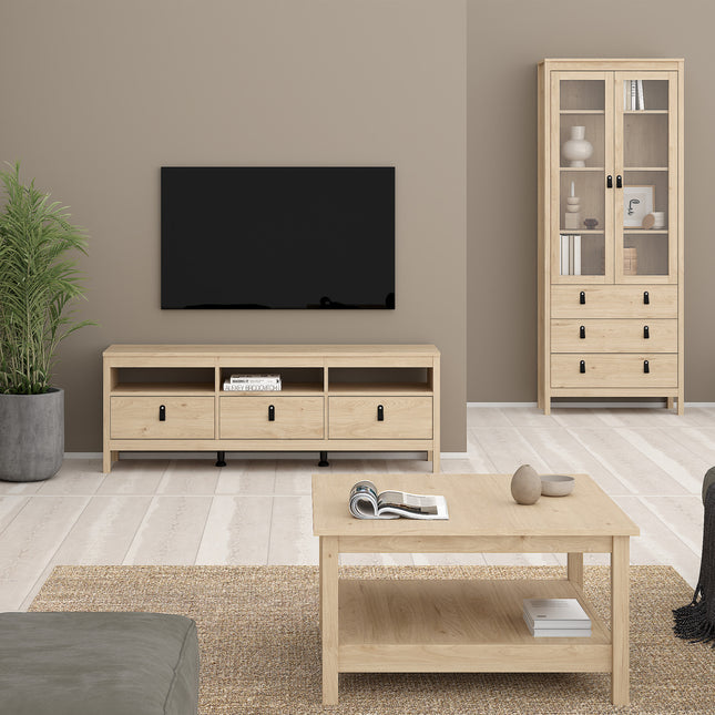 Square coffee table with a smooth wooden surface and open shelf, set on a light-coloured wooden floor