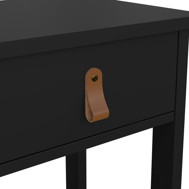 Black bedside table with a single drawer featuring a leather handle and a minimalist design