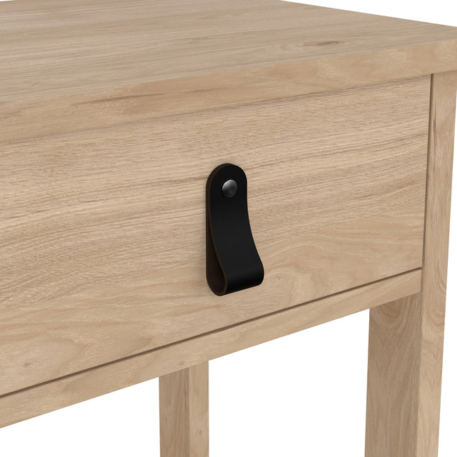 Light wooden bedside table featuring a single drawer with a black leather handle