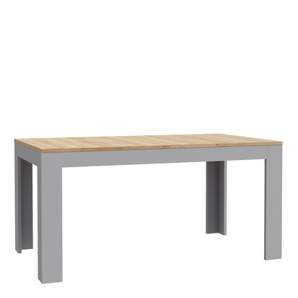 Rectangular dining table with a light wood top and grey legs, featuring a simple, contemporary design