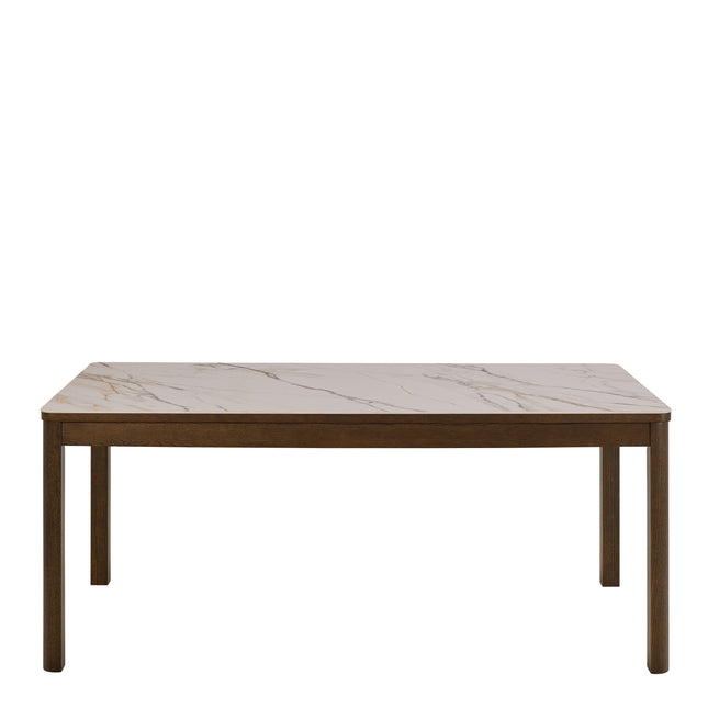 Rectangular dining table with a cream ceramic top featuring subtle marbling, supported by a wooden frame and legs