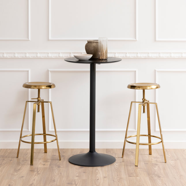 Tall round bar table with a sleek black top and a slender black base, accompanied by two gold metal stools