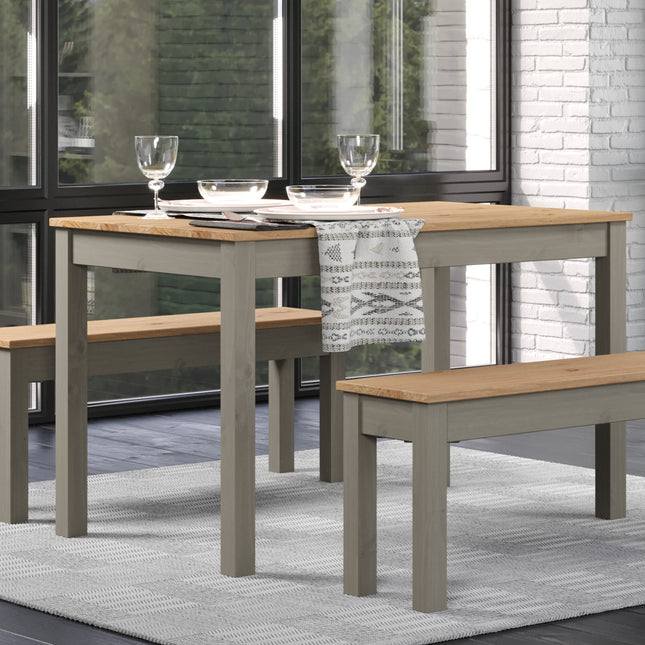 Rectangular dining table with a natural wood top and grey legs, accompanied by two matching benches