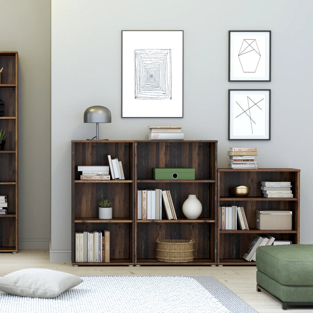 Essential Vintage Oak Bookcases close-up of dark oak finish open shelving with decorative objects