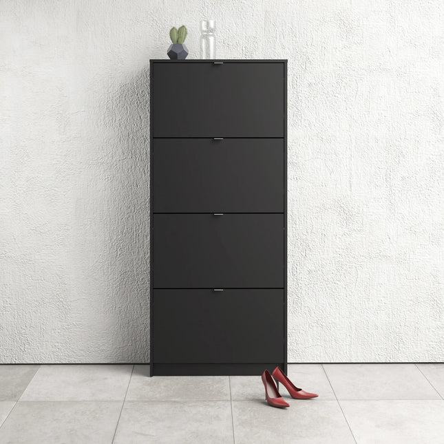 Tall black shoe cabinet with four tilting doors and slim metal handles, styled with red heels and small cactus on top