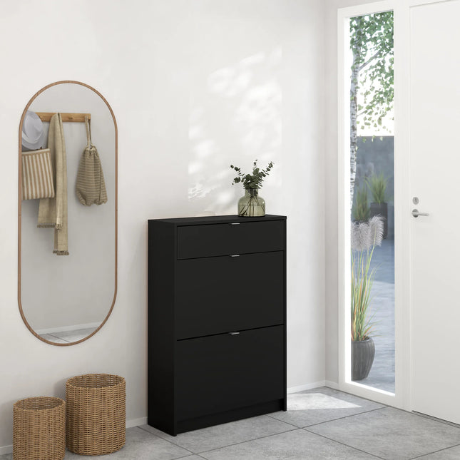 Black shoes cabinet with two flip-down doors and single top drawer in hallway