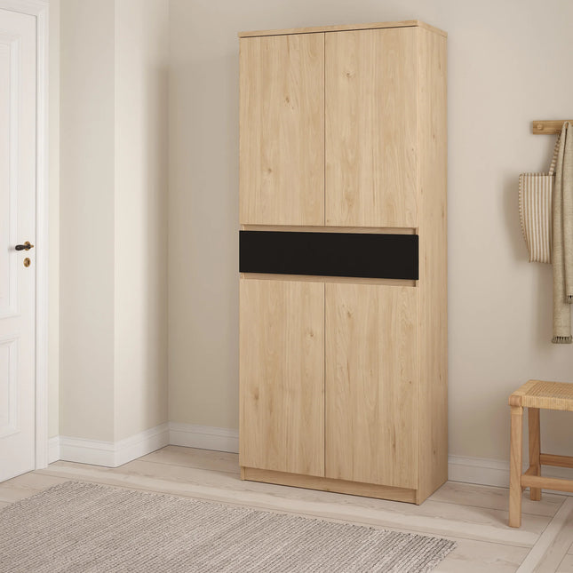 Naia shoe cabinet close-up of light oak finish with central black drawer front