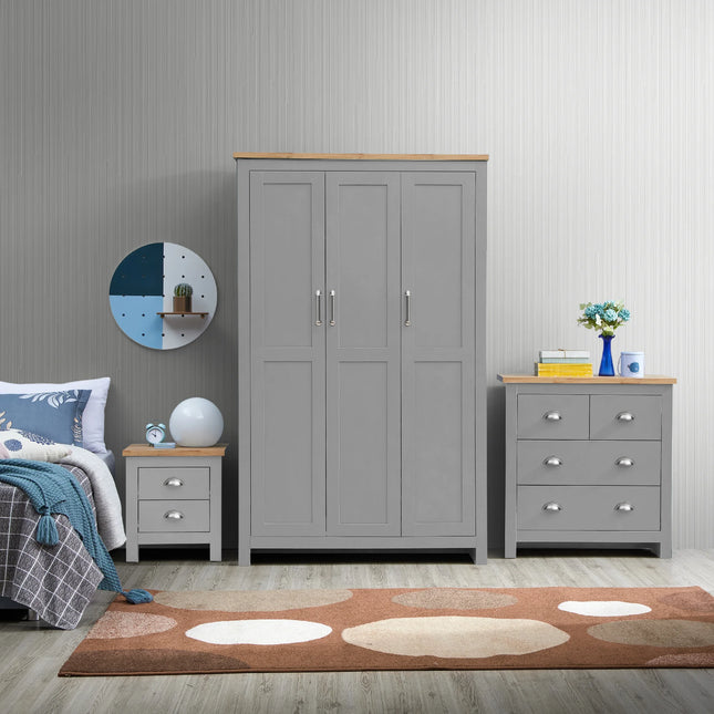 Lisbon bedside table in grey with oak-effect top and two drawers, styled beside matching wardrobe