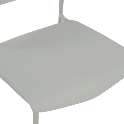 Close-up of pale grey plastic seat and top of slim metal leg junction