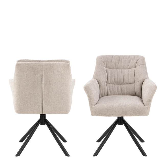 Alonso dining chair close-up of beige textured upholstery, padded armrests and black metal swivel base