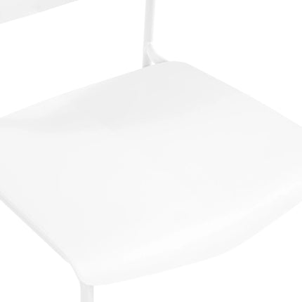 Close-up of white Aspen dining chair seat and top of slim white metal leg