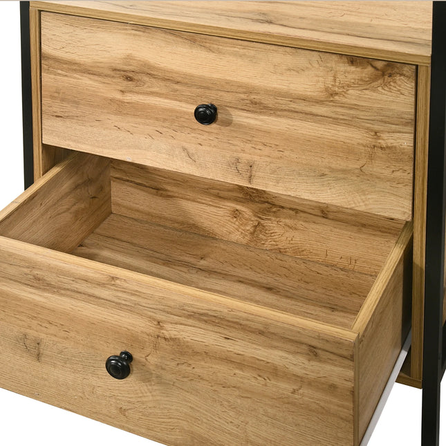 Open drawer detail of Zahra wardrobe in oak-effect finish with round black knob