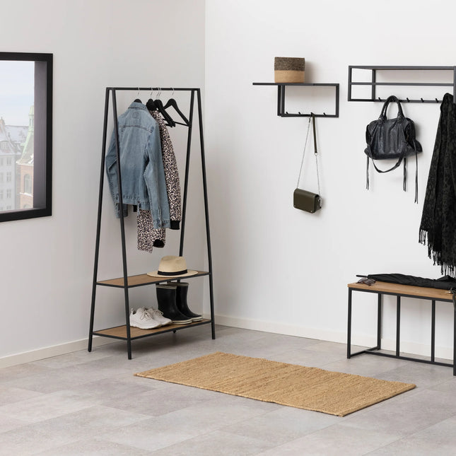 Seaford black metal freestanding clothes rack with two oak-effect shelves and hanging bar