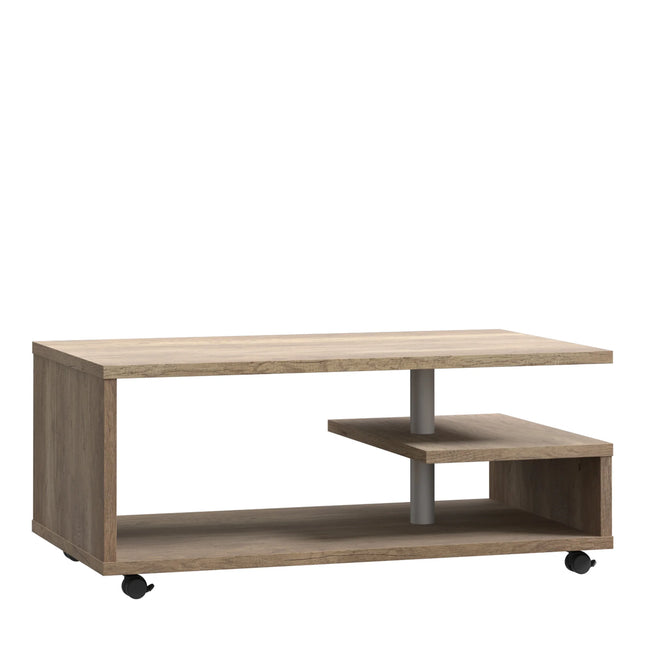 Bailey coffee table G‑shaped oak finish with staggered shelves and black castors