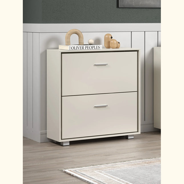 Close-up of Lido shoe cabinet top with two beige tilt-out drawers and slim metal handles