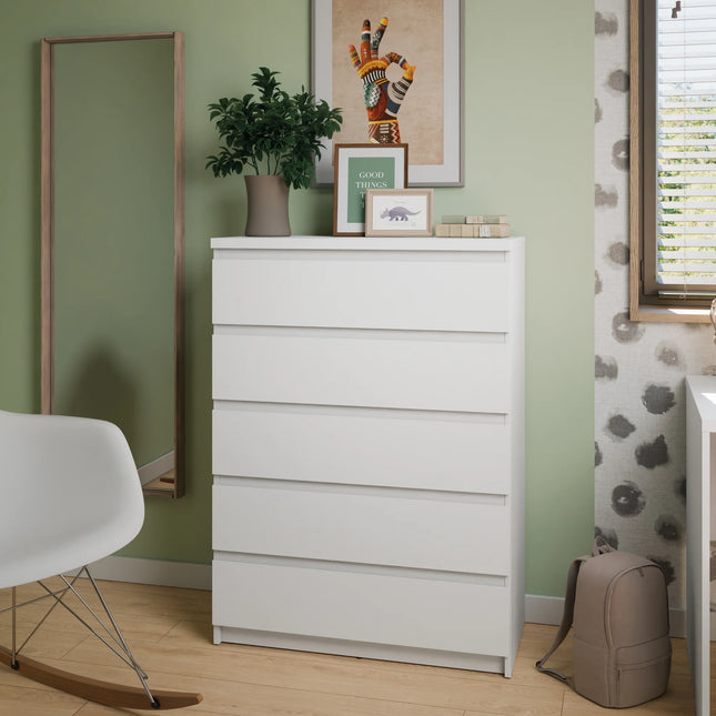 Fribo alpine white 5-drawer chest corner with decorative frames, plant and backpack
