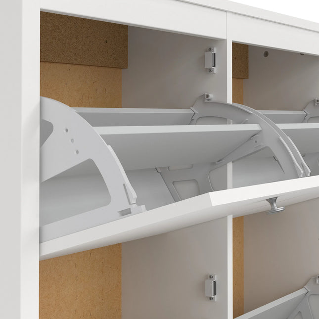 Close-up of internal tilting shoe compartment mechanism and magnet catch in white frame