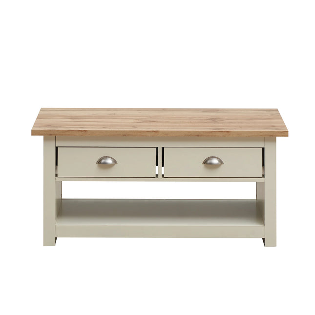 Close-up of Lisbon coffee table top in light oak with cream-painted base and two cup handles