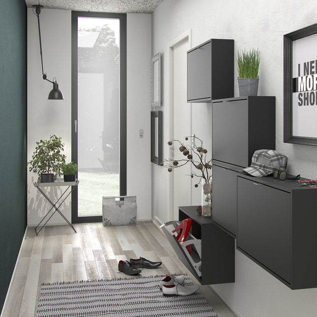 Wall-mounted grey shoe cabinet with one drop-down compartment open revealing internal shoe storage